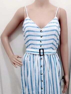 A dress with stripes, buttons and a belt